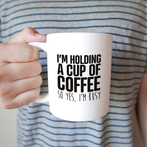 I'm holding A cup of coffee